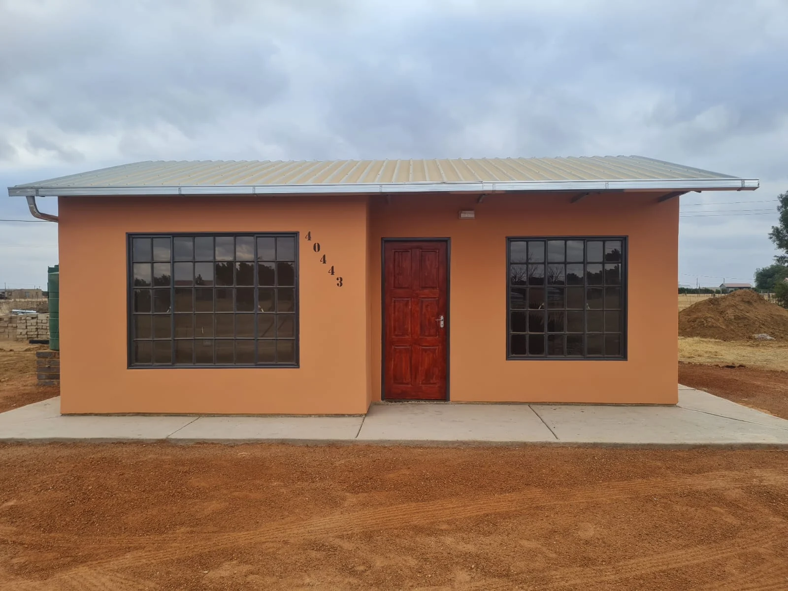 Completed yellow housing unit